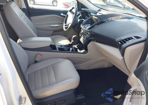 2017 Ford Escape Titanium z USA, uszkodzony, nr VIN 1FMCU9JDXHUE03734